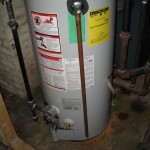 This is the new water heater, which our plumber thoughtfully installed rather quickly, leaving us without hot water only a couple days.